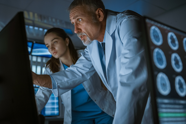 Doctors at a computer