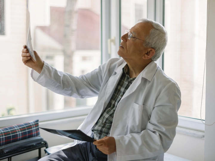Doctor reviewing scans