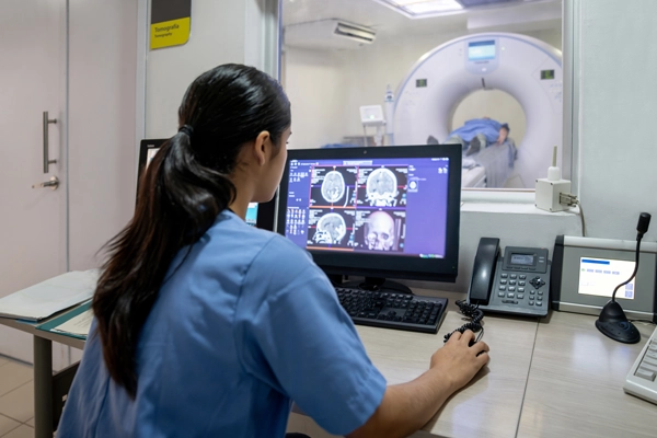 Doctor reviewing scans