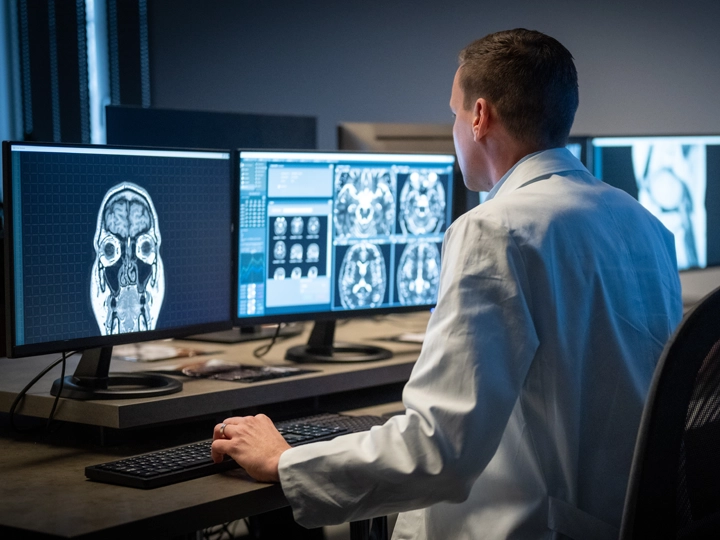 Doctor reviewing scans
