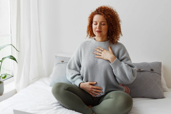 Woman taking deep breath
