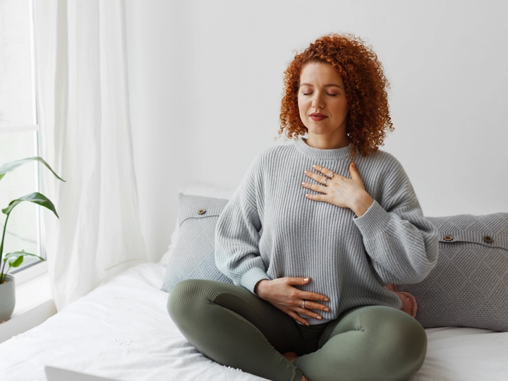 Woman taking deep breath