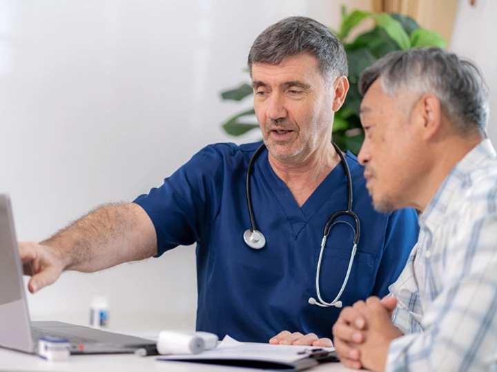 A doctor talking to a patient