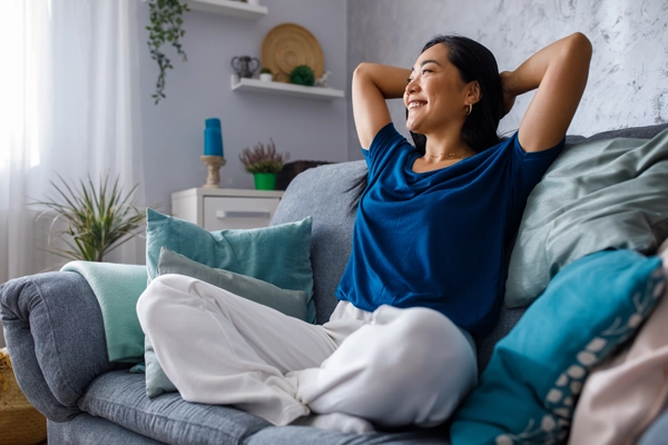 A woman sitting on the sofa 