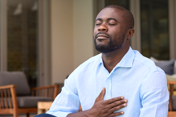Man breathing deeply