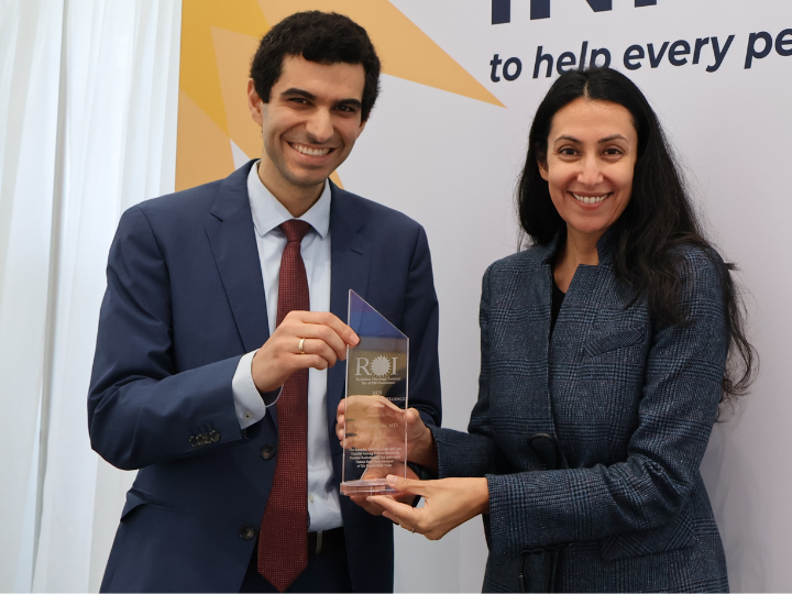 Doctors holding award