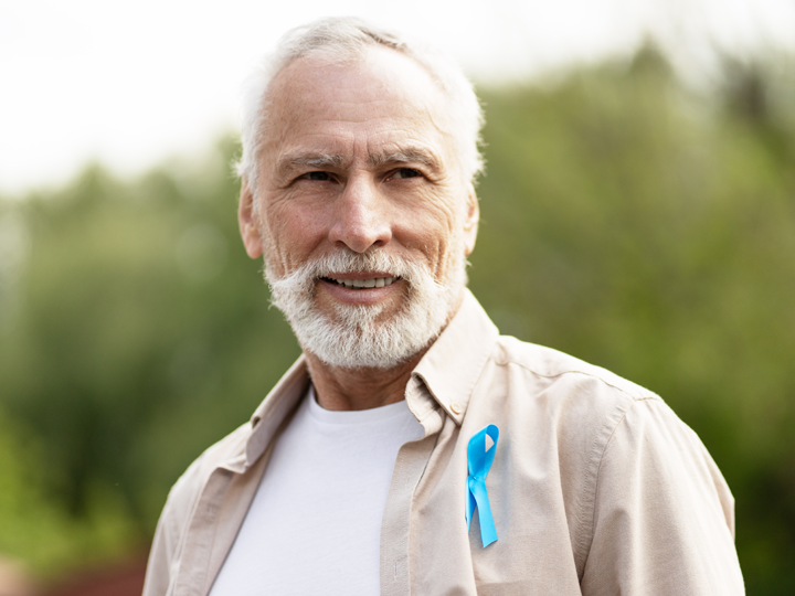 Man with cancer ribbon