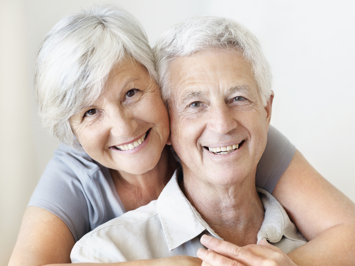 Two smiling people