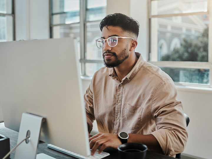 Man looking at a computer
