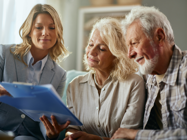 Group of people looking at documents