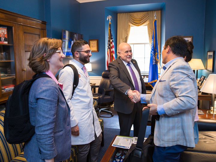 Staff and doctors meeting law maker