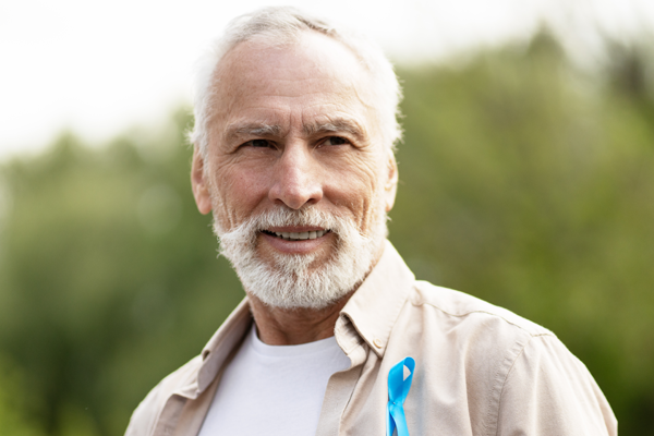 Man with cancer ribbon