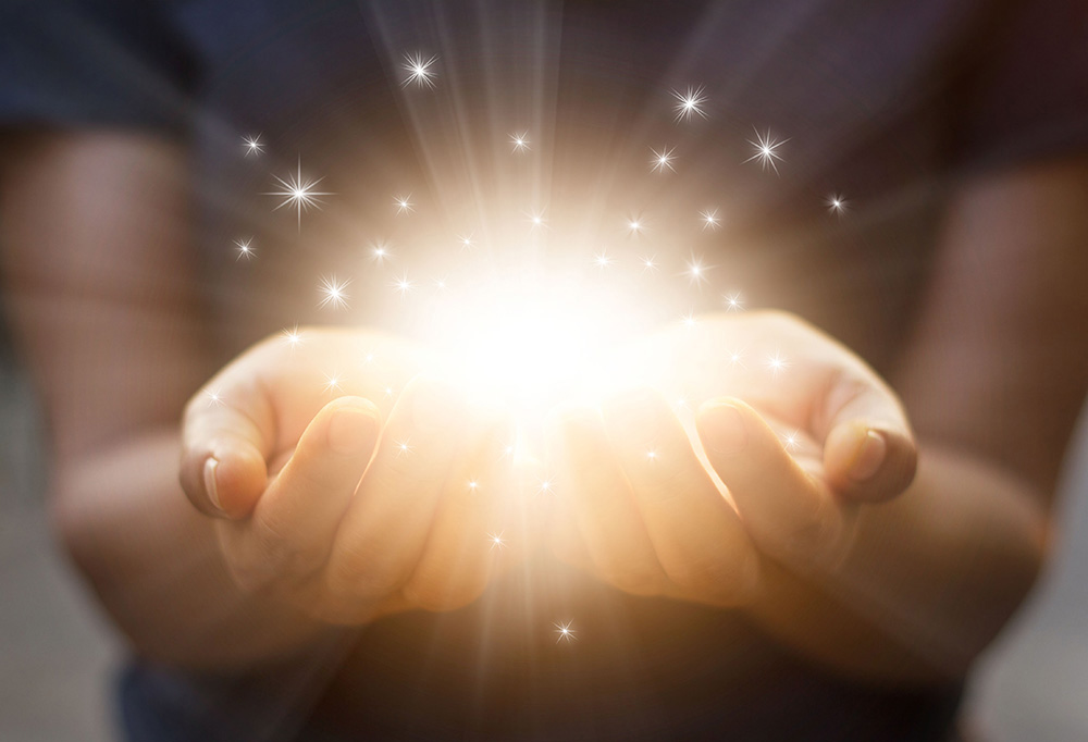 Hands with light