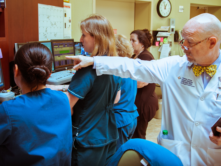 Doctors working in the control room