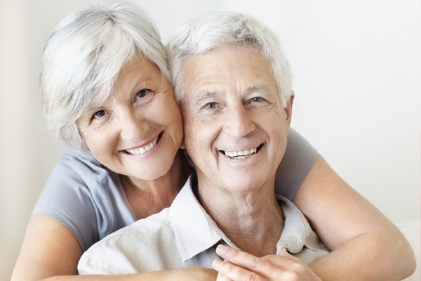 Two smiling people
